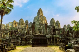 Bayon Temple at Angkor Wat Archaeological Park in Siem Reap, Cambodia, showcasing its iconic stone face towers and ancient Khmer architecture